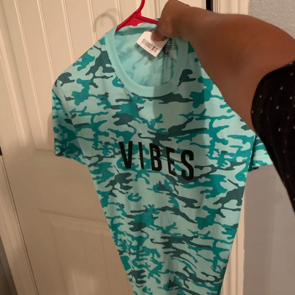 Cool vibe shirt ( brand new ) never used